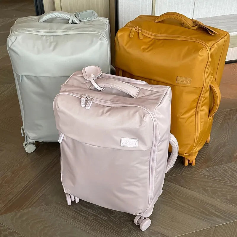 20-inch waterproof Oxford cloth suitcase in bluestone green colour with universal wheels and antibacterial lining