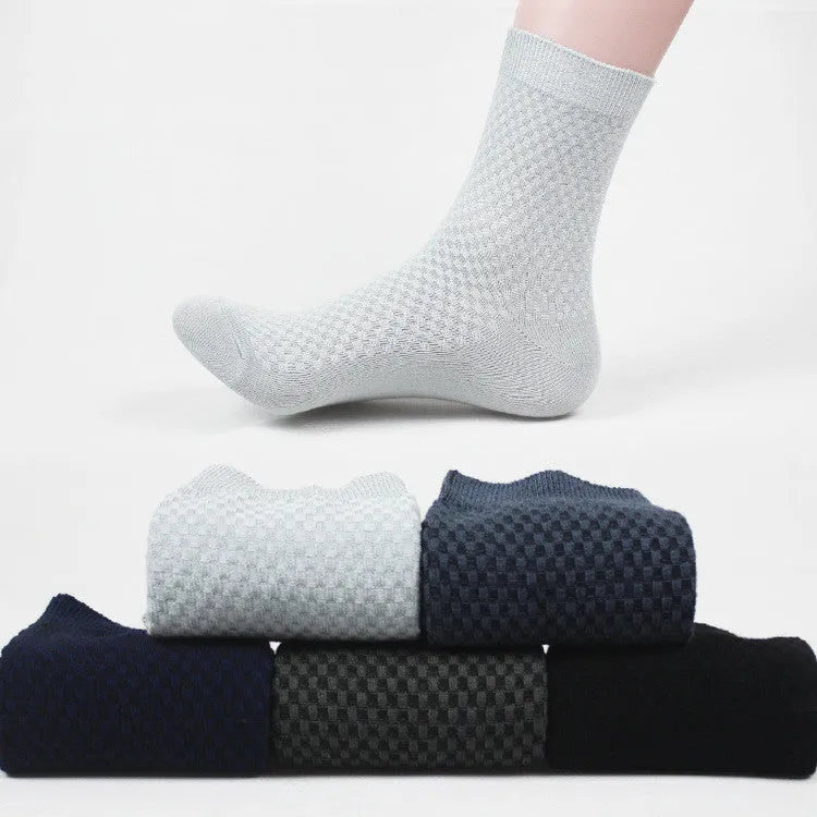 Men's bamboo fibre socks with a small square pattern in black, grey blue, iron grey, navy blue, and silver grey.