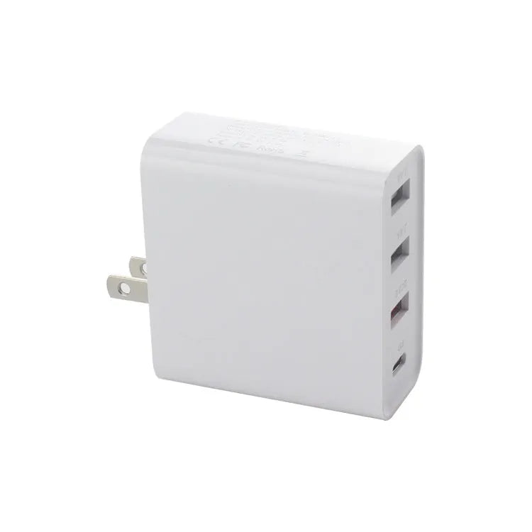Black 48W four-port USB-C desktop charger with UK plug on a white background.
