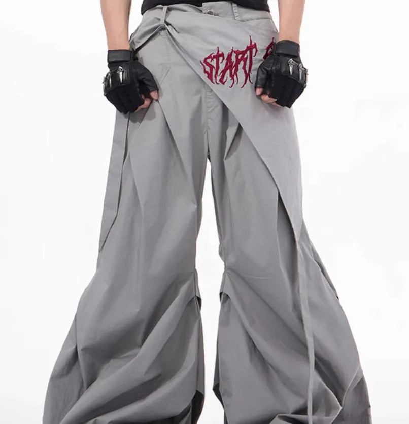 Boy modelling black wide-leg Korean-style casual trousers.