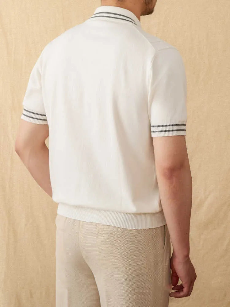 Short-sleeved lapel collar polo shirt in a light apricot colour, made from thin knitted cotton blend fabric.