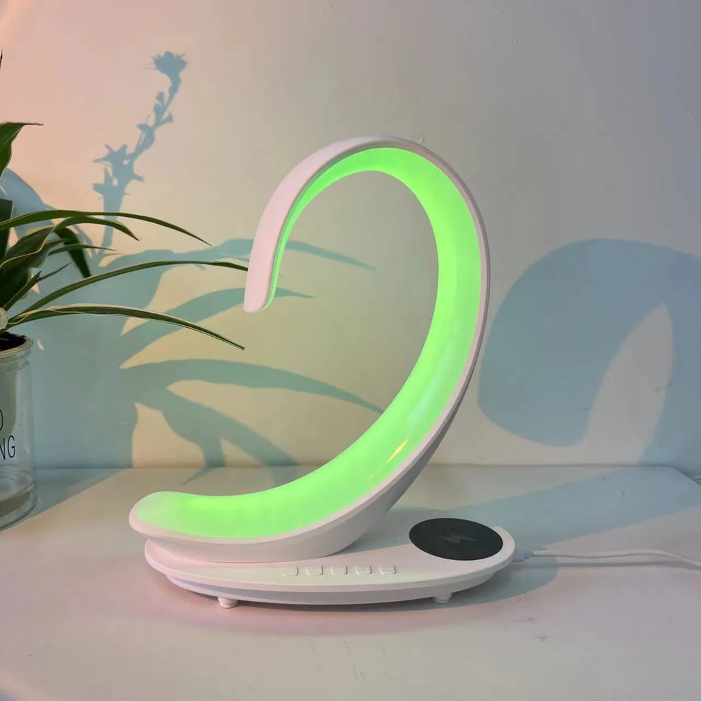 White swan shaped desktop atmosphere light with colourful LEDs and built-in Bluetooth speaker