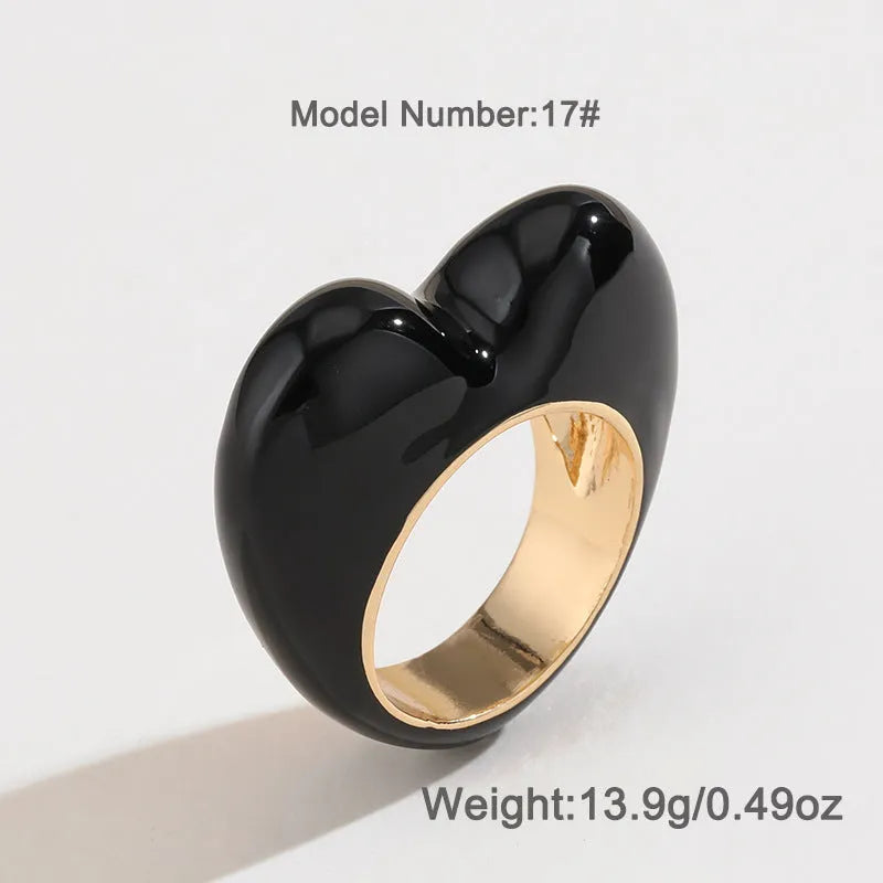 Three-dimensional heart-shaped enamel ring in a choice of colours on a zinc alloy band.