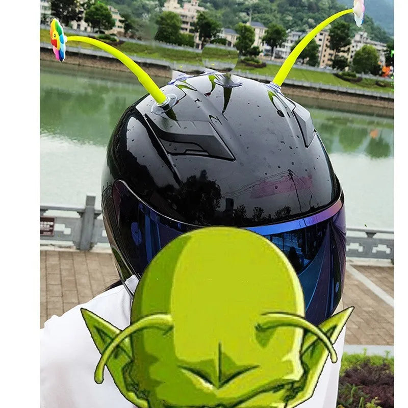 Yellow silicone sunflower helmet decoration with suction cup on a motorbike helmet.