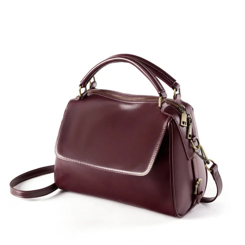 Women's soft genuine leather crossbody tote bag in a cross square shape with double straps.