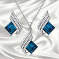 Women's electroplated necklace and earring set with alloy pendant and glass accents
