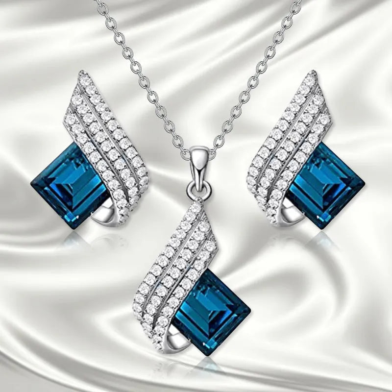 Women's electroplated necklace and earring set with alloy pendant and glass accents