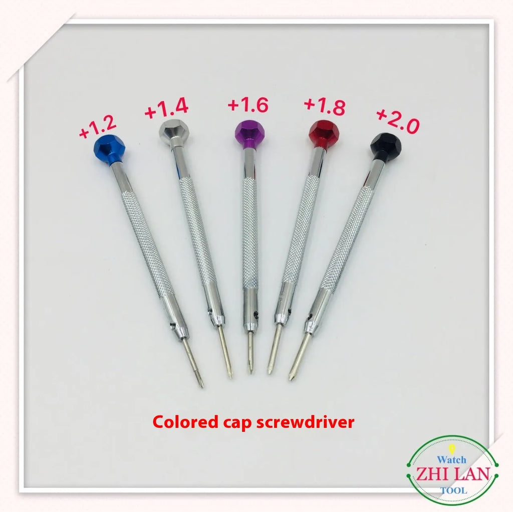 Six colour-coded watch repair screwdrivers with aluminium handles and magnetic steel tips on a grey background.