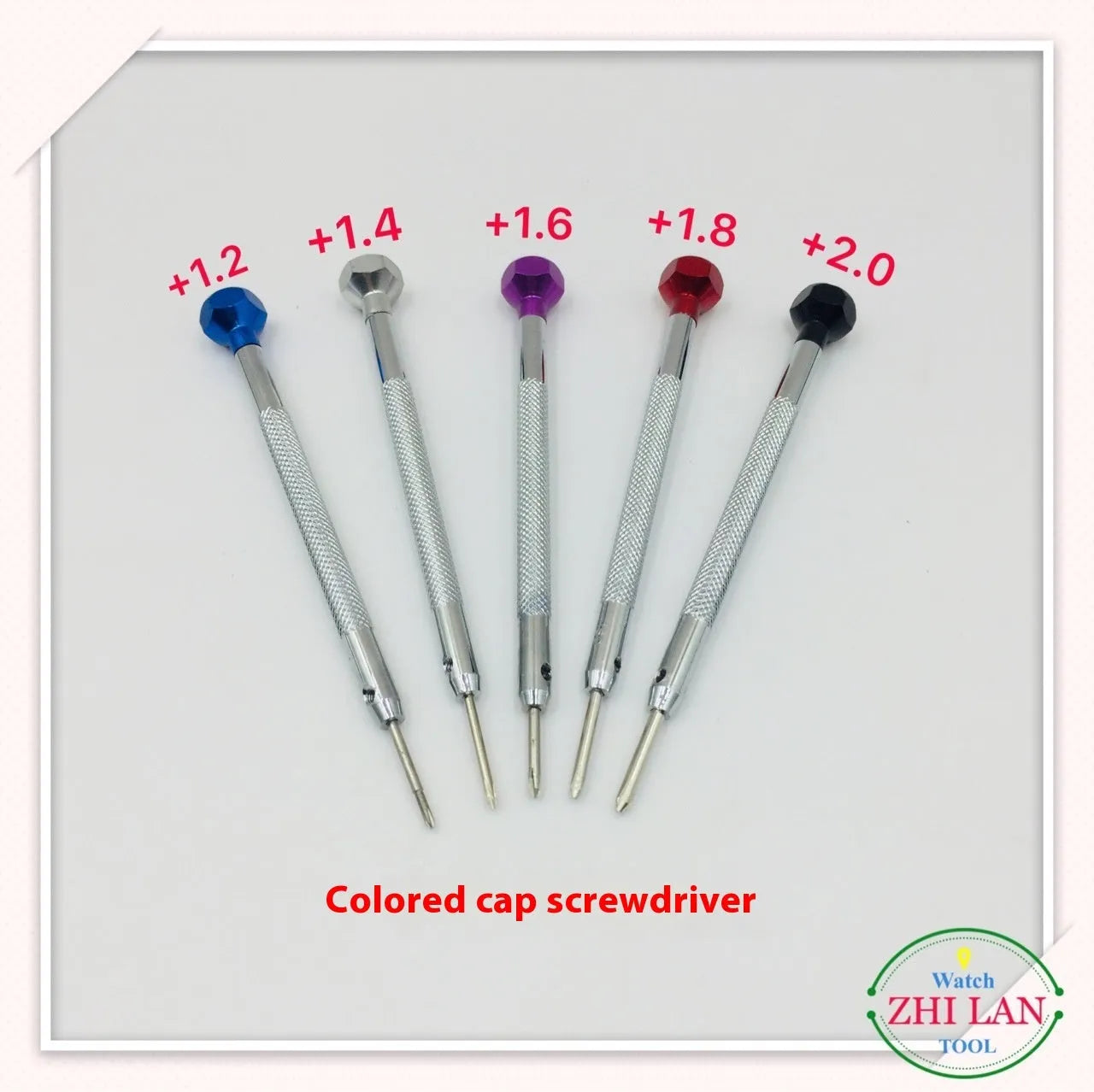 Six colour-coded watch repair screwdrivers with aluminium handles and magnetic steel tips on a grey background.
