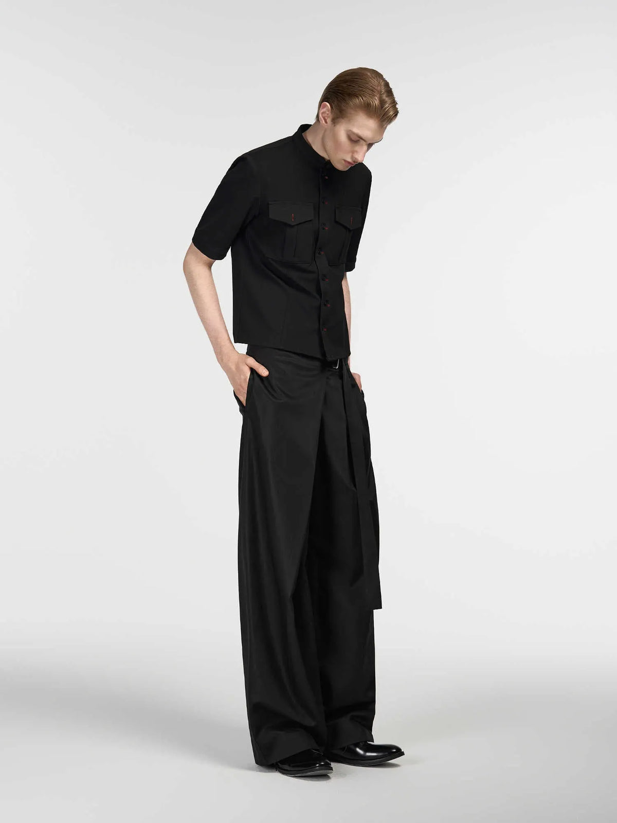 Black straight-leg trousers with adjustable waist and single pleated detail in tencel-cotton blend