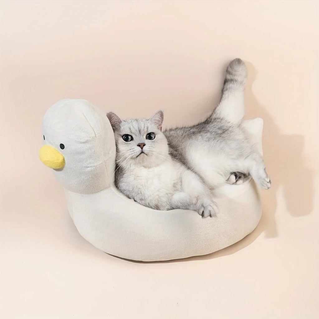 Duck-shaped fluffy pet bed for small dogs and cats in blue or white