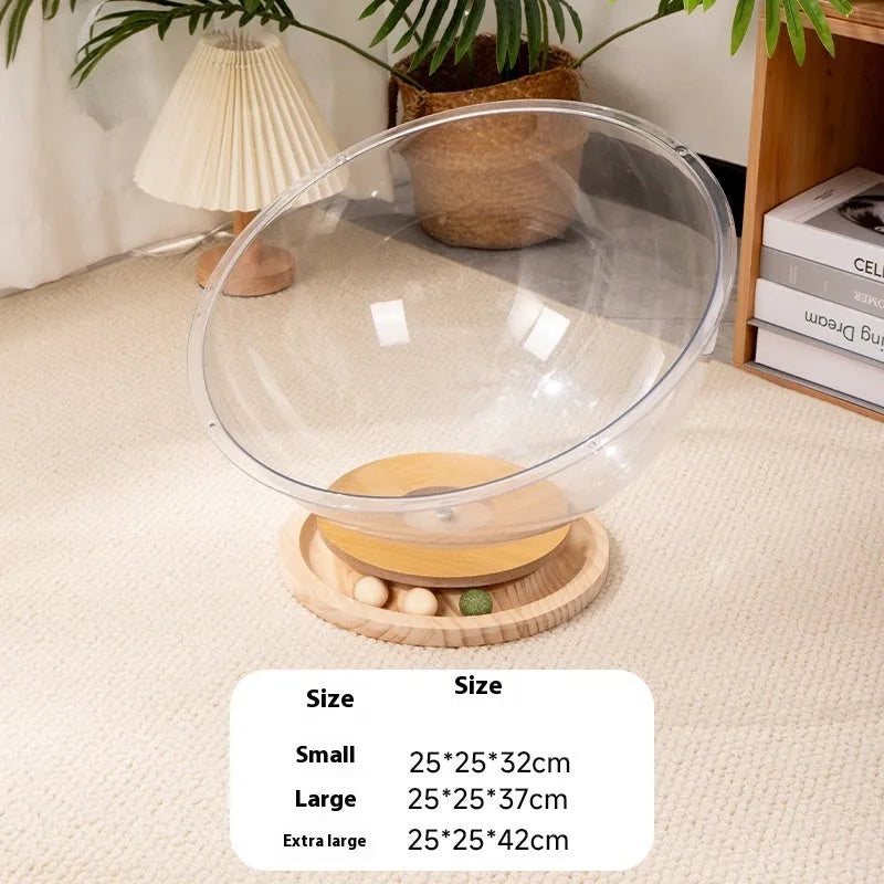 Transparent acrylic capsule cat bed with turntable base on wooden floor