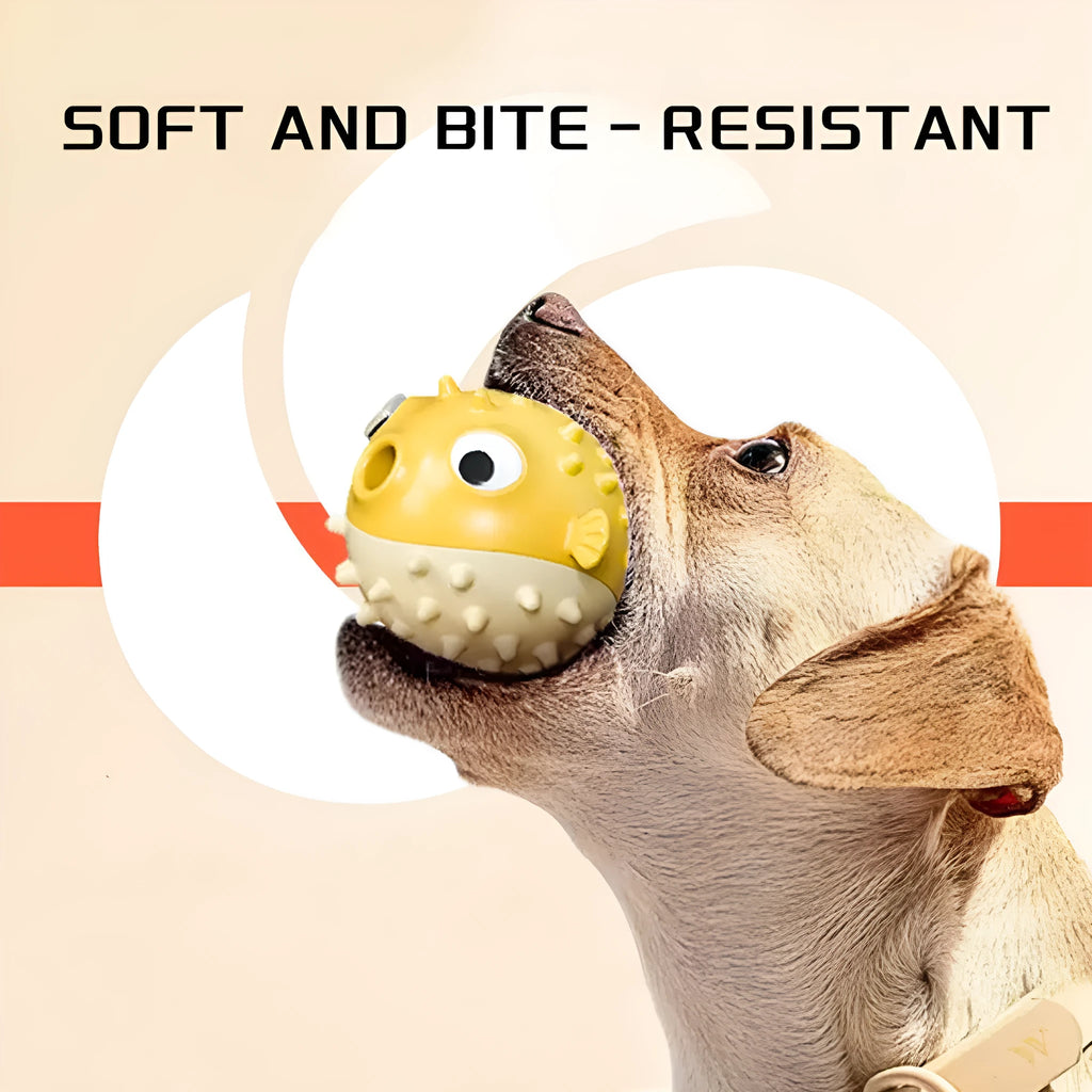 Yellow fish-shaped vinyl dog chew toy with textured surface and squeaker
