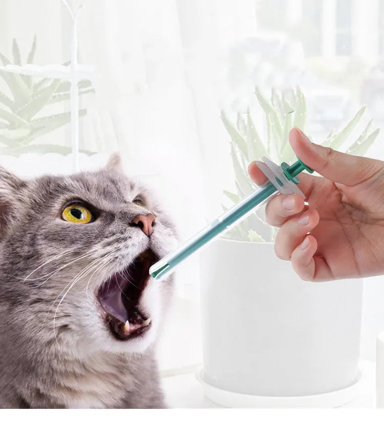 Two pet pill shooters with soft silicone tips for cat and dog tablet administration