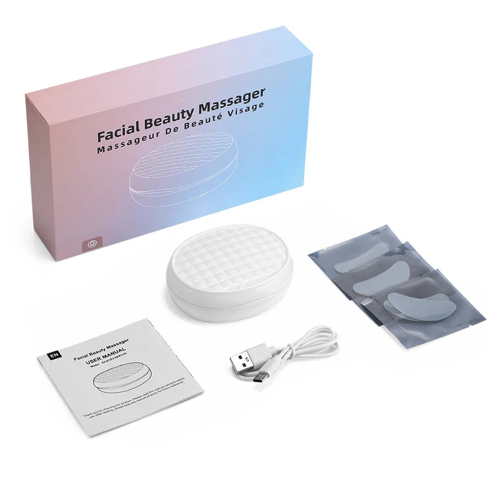 White wireless red light eye massager with EMS technology for dark circles and facial treatments