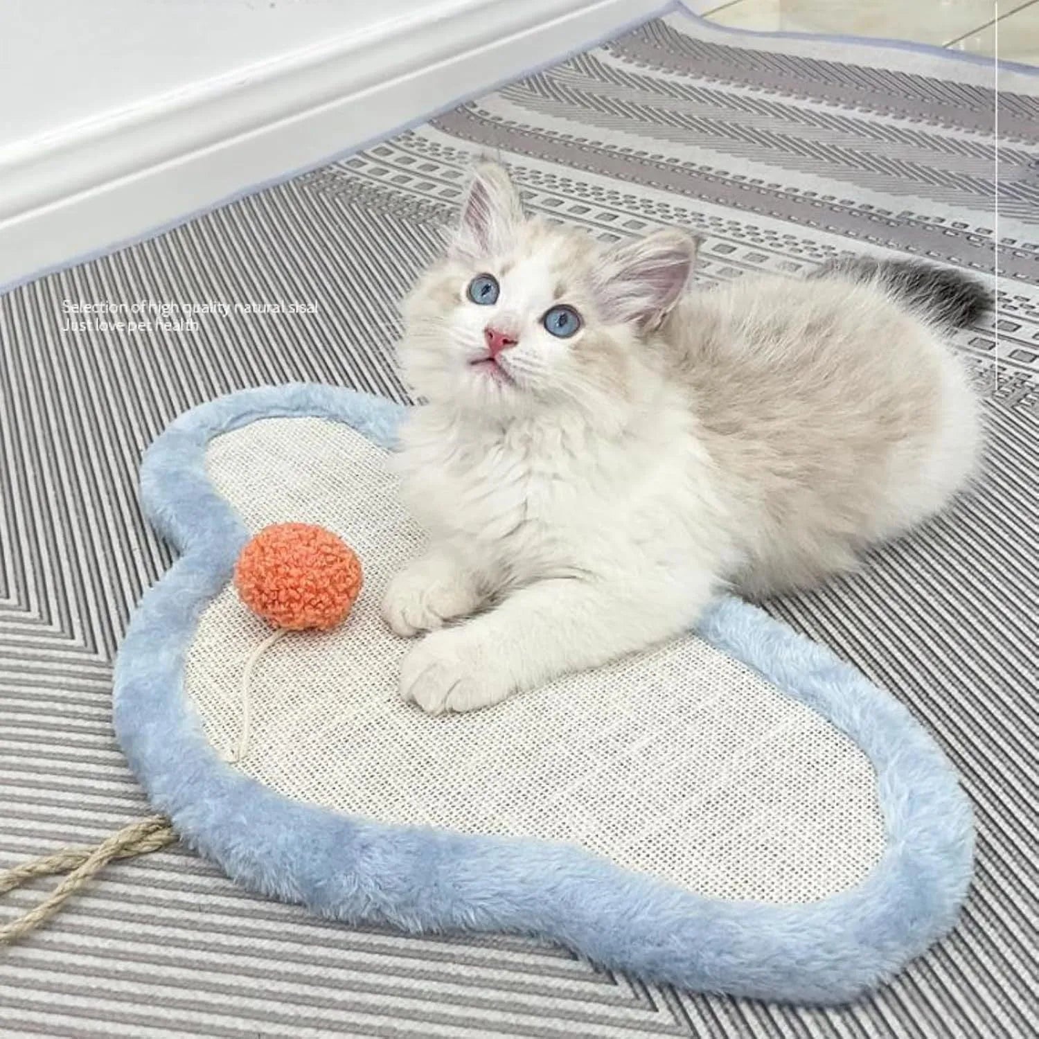 White wall mounted cat scratching mat with sleeping cat pattern design in natural sisal material