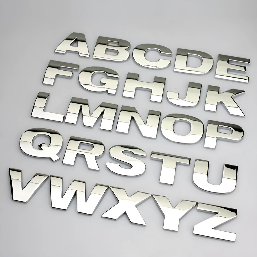Zinc alloy 3D car bumper sticker showing raised metallic letter on black background
