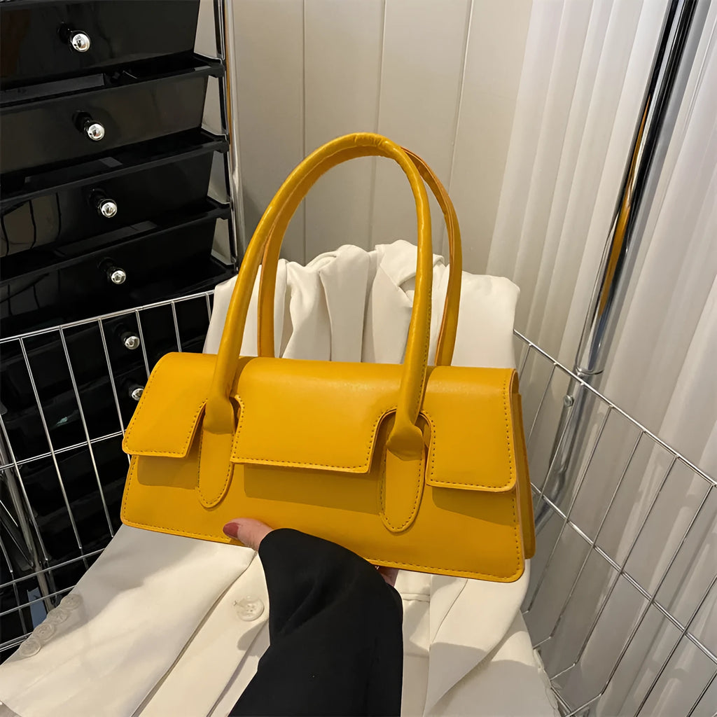 Women's black PU leather square shoulder bag with single strap and stitching details