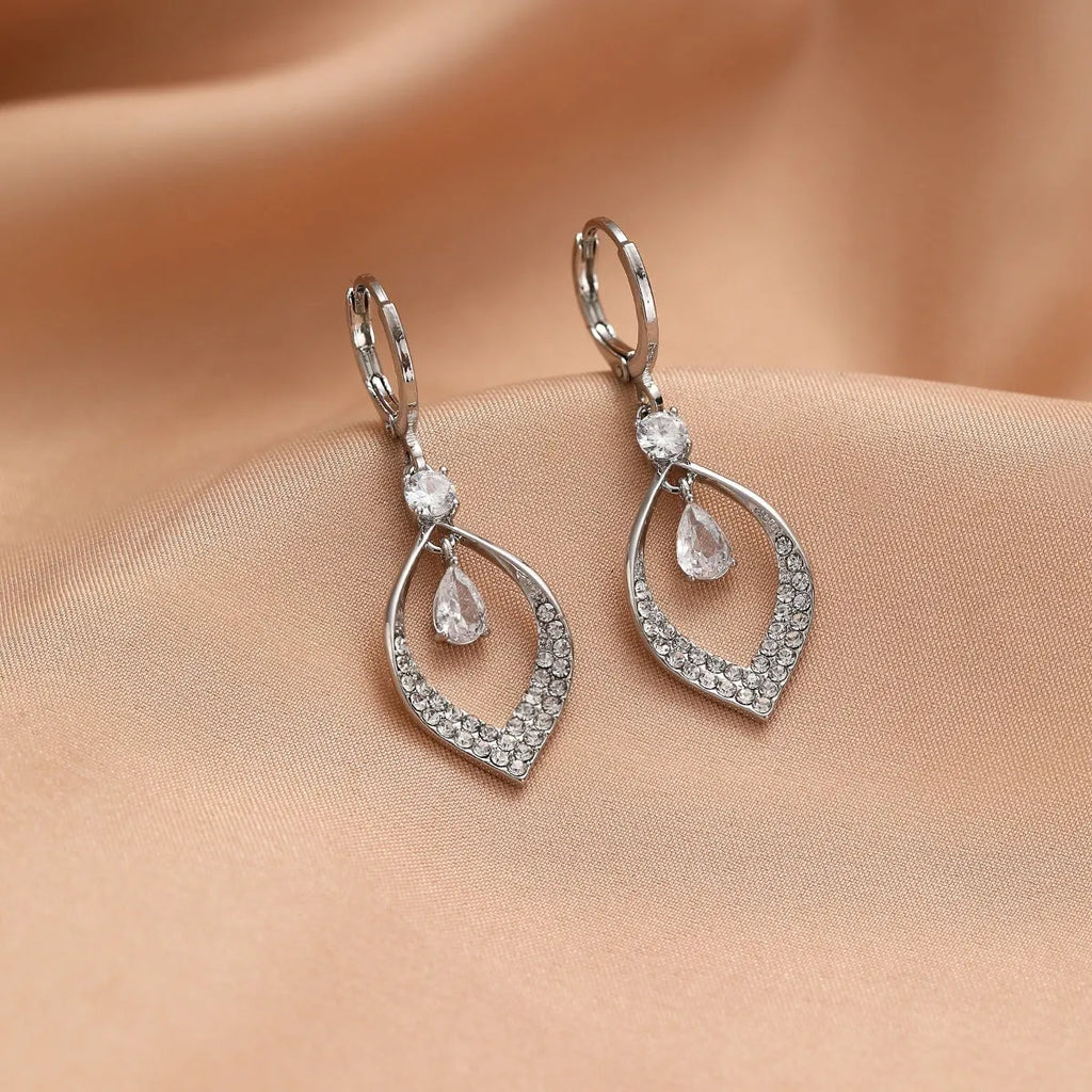 A pair of teardrop-shaped zircon water drop tassel earrings with gold-coloured buckles.