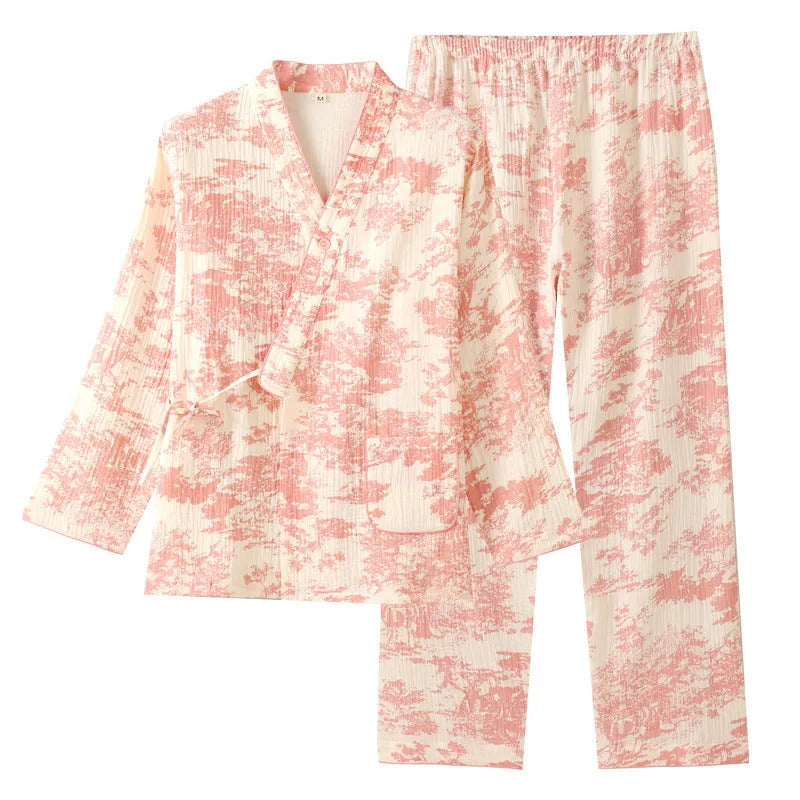 Women's pink cotton gauze lounge suit two-piece set with lace-up front trousers detail.