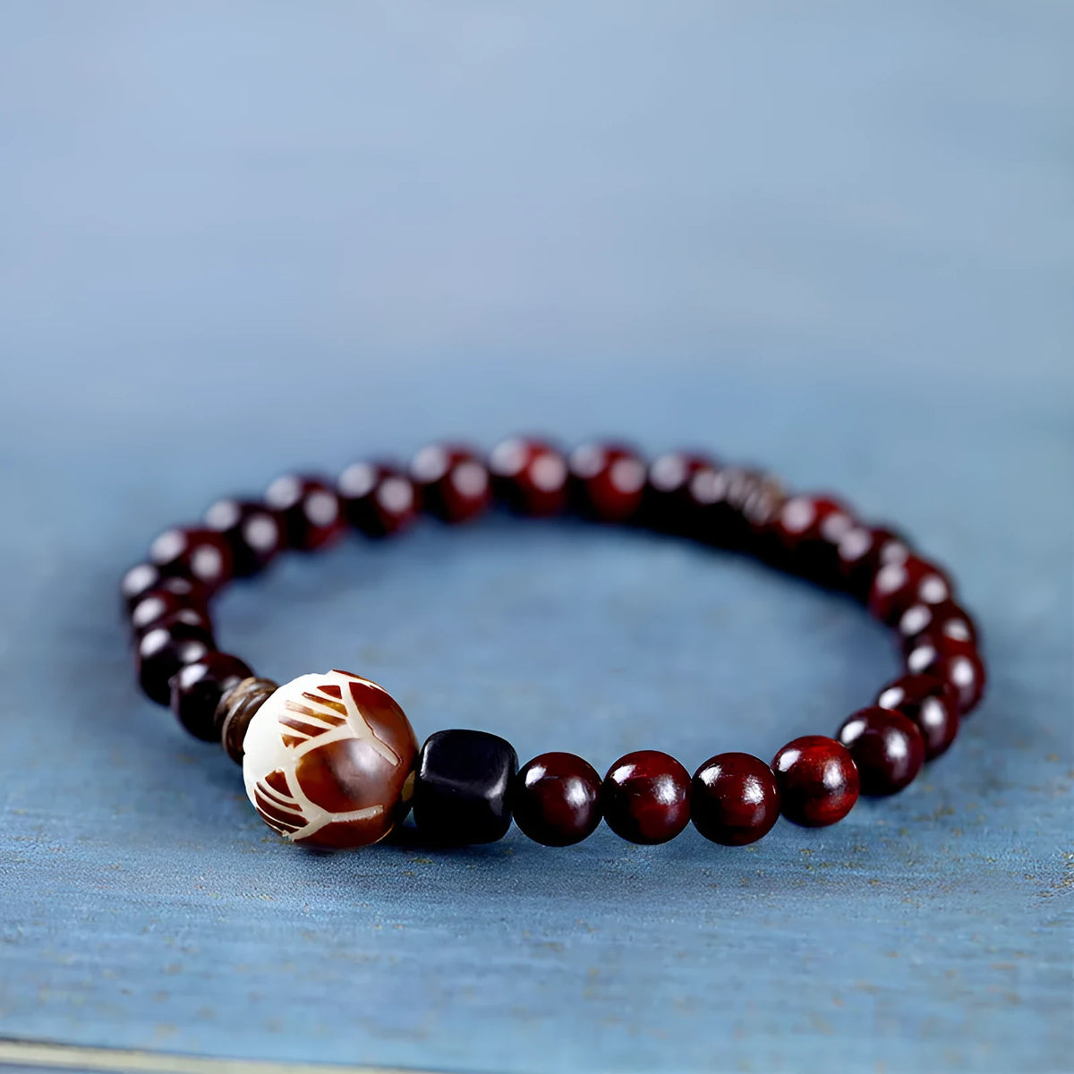 Natural rosewood double-ring bracelet with hand-knitted beads showing retro flower design