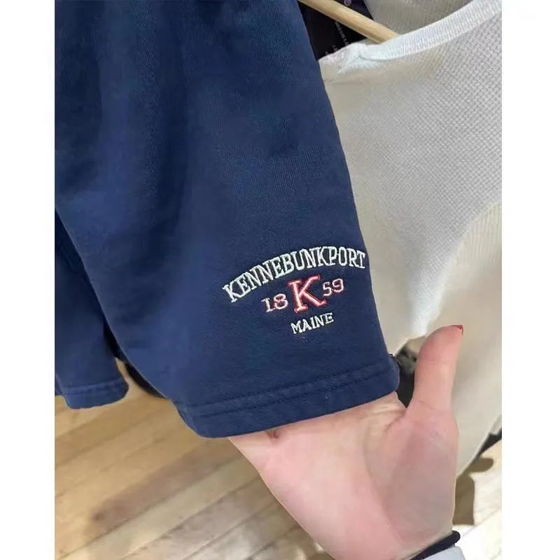 Dark blue and navy cotton sports shorts with white flag embroidery for women