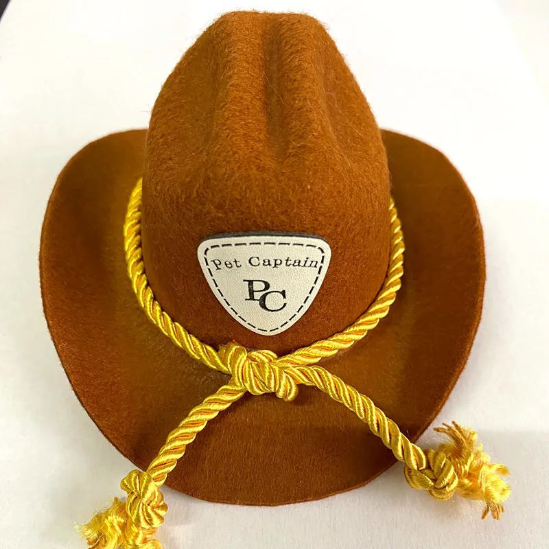 British cowboy style hat for a cat, made from brown non woven fabric with a black ribbon trim.