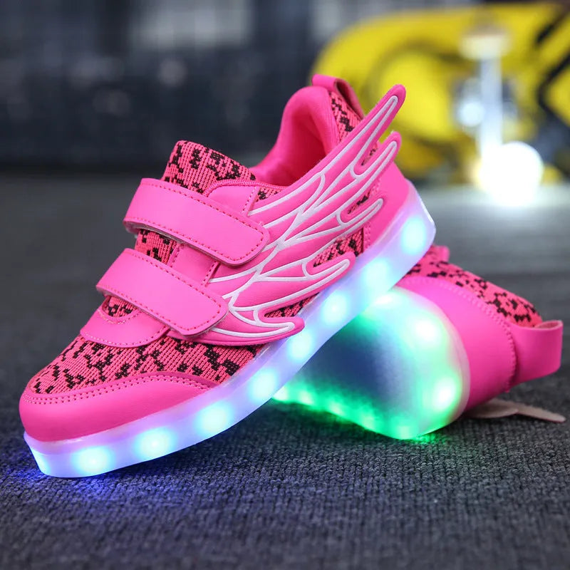 USB rechargeable children's LED light up trainers in plum red and white showing flashing soles.