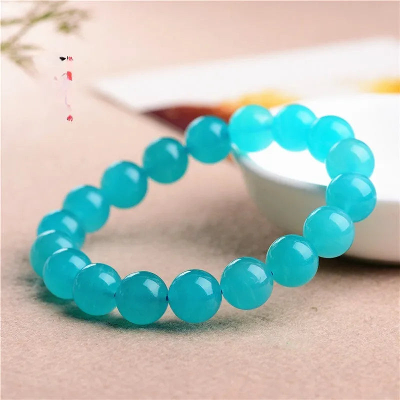 Natural Amazonite crystal bracelet with scattered polished beads in ice colour variations