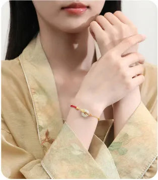 Koi Peace Buckle Hetian Jade Red Rope Bracelet with gold clasp on 925 silver
