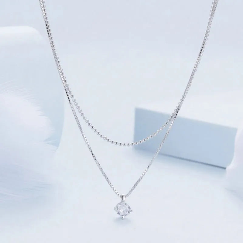 Double-layer sterling silver necklace with S925 pendant on pearl chain in silver colour
