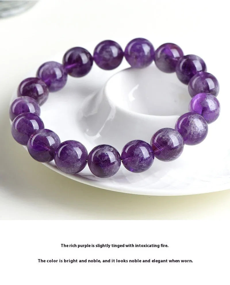 Natural purple crystal bracelet with scattered beads and Ruyi symbol design in various size options.