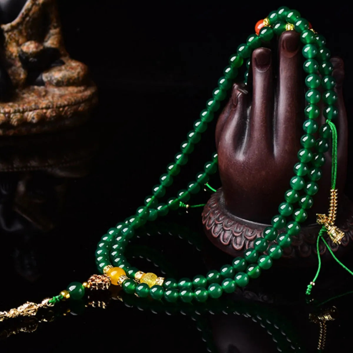 Handcrafted multi-circle green agate bracelet with natural stone beads on a wrist.