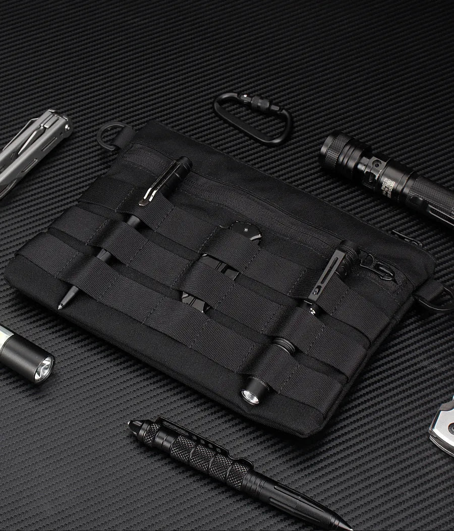 Black military-style Oxford cloth waist bag shown closed, measuring 18cm.