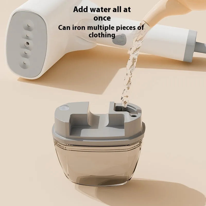 Blue and white handheld garment steamer with water tank and power cord on a white background.