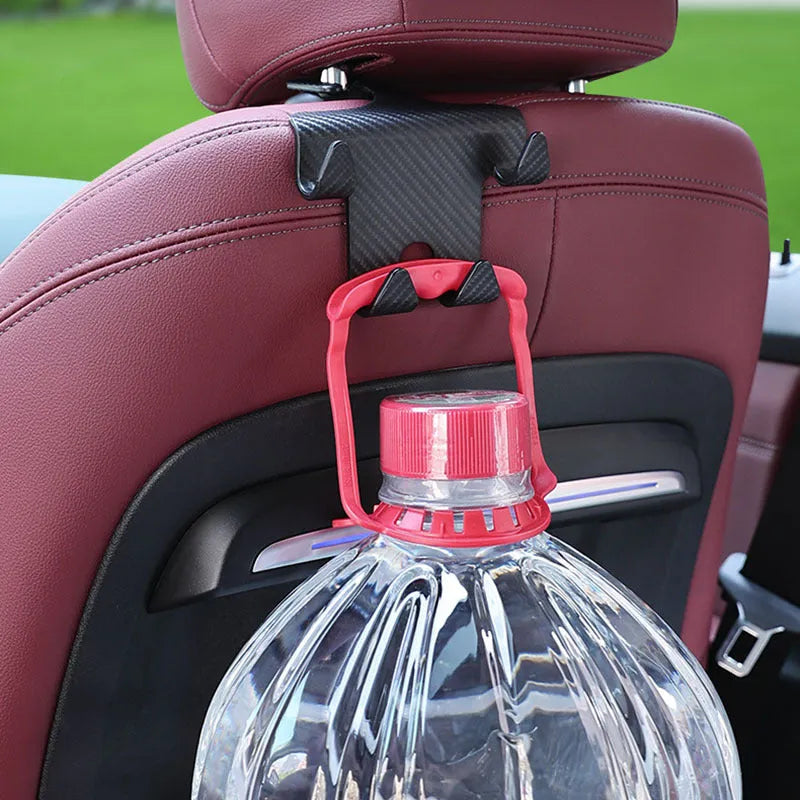 Black ABS car hook and mobile phone bracket for rear seat back storage.