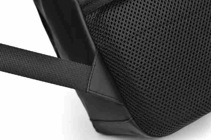 Waterproof large capacity black PU backpack with sewing thread detailing, shown closed.