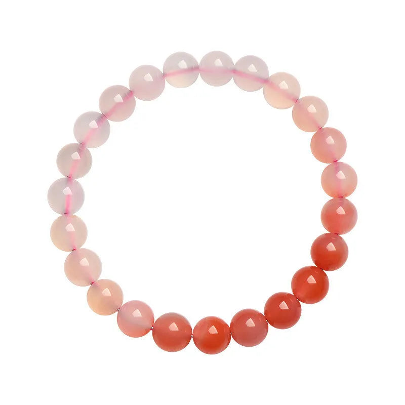 Natural gradient Yanyuan agate bracelet showing colour variation on geometric beads in single circle design