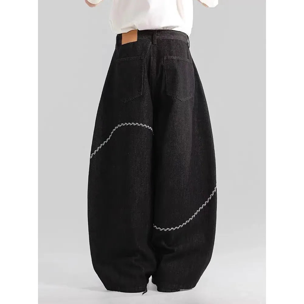 Black straight-leg denim trousers with mid waist design and zip placket closure for teenage daily wear