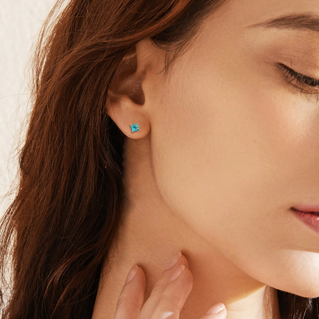 Gold-plated drop earrings with a candy-coloured finish and pear-shaped zircon detail.