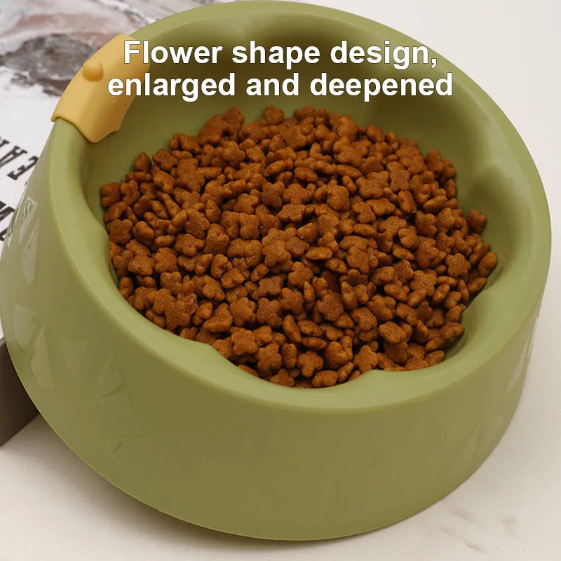 Green plastic double bowl for dog and cat food and water with anti-tip base.