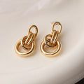 Geometric copper earrings with irregular shape in gold colour options 44093 and 44094