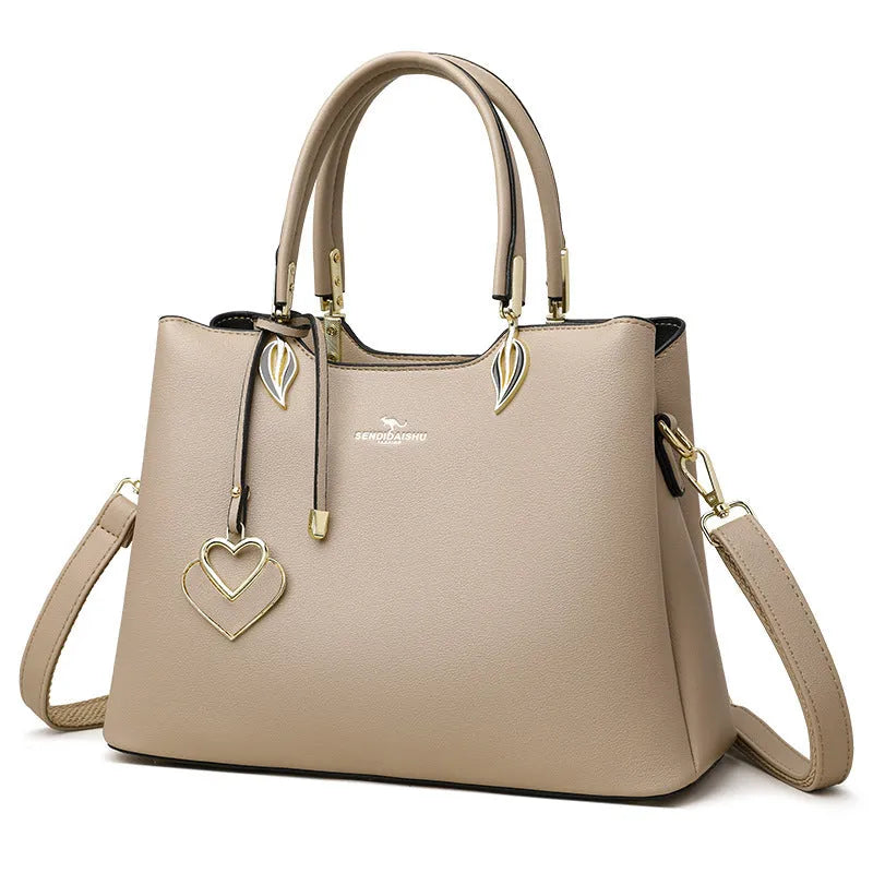 Women's black PU messenger bag with multi-layer shoulder strap in urban simplicity style