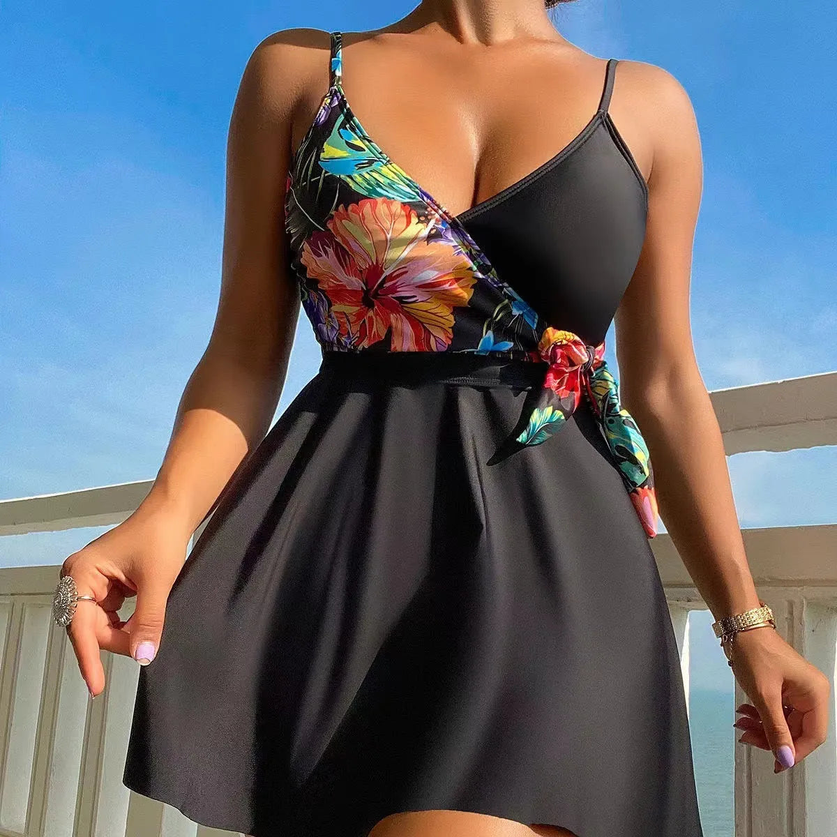 Black women's high-waist briefs with a printed split bikini design for sports and swimming.
