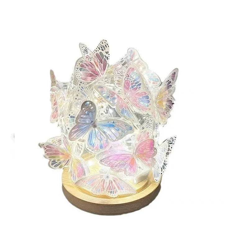 Butterfly-themed DIY night light with glass lampshade on a raw wood base.