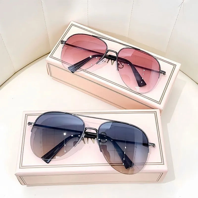 Metal aviator sunglasses with UV protection resin lenses in various colour options.