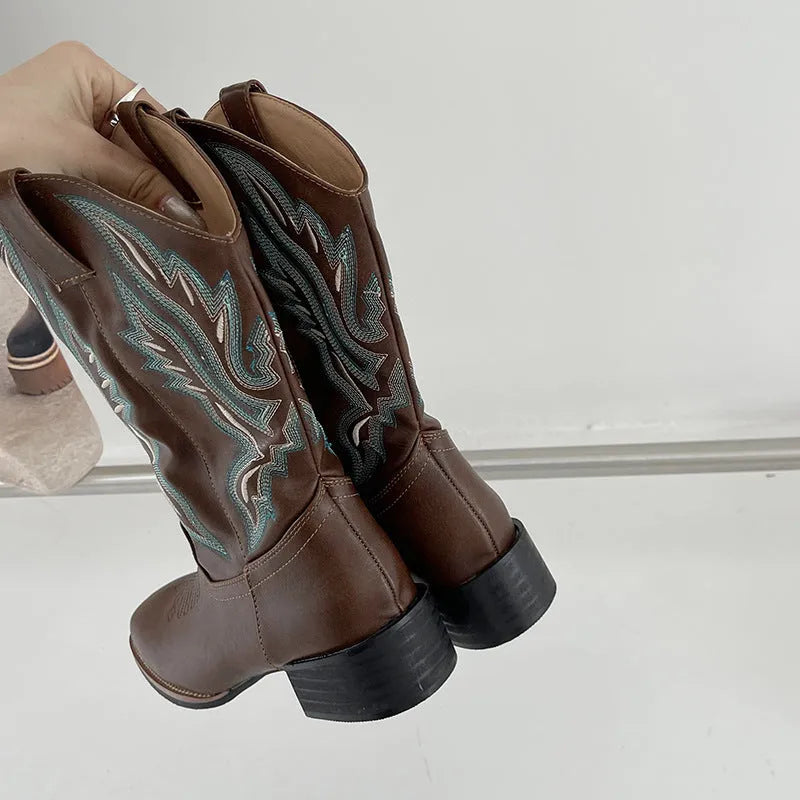 Brown women's embroidered mid-calf Martin boots with a square heel and leather lining.