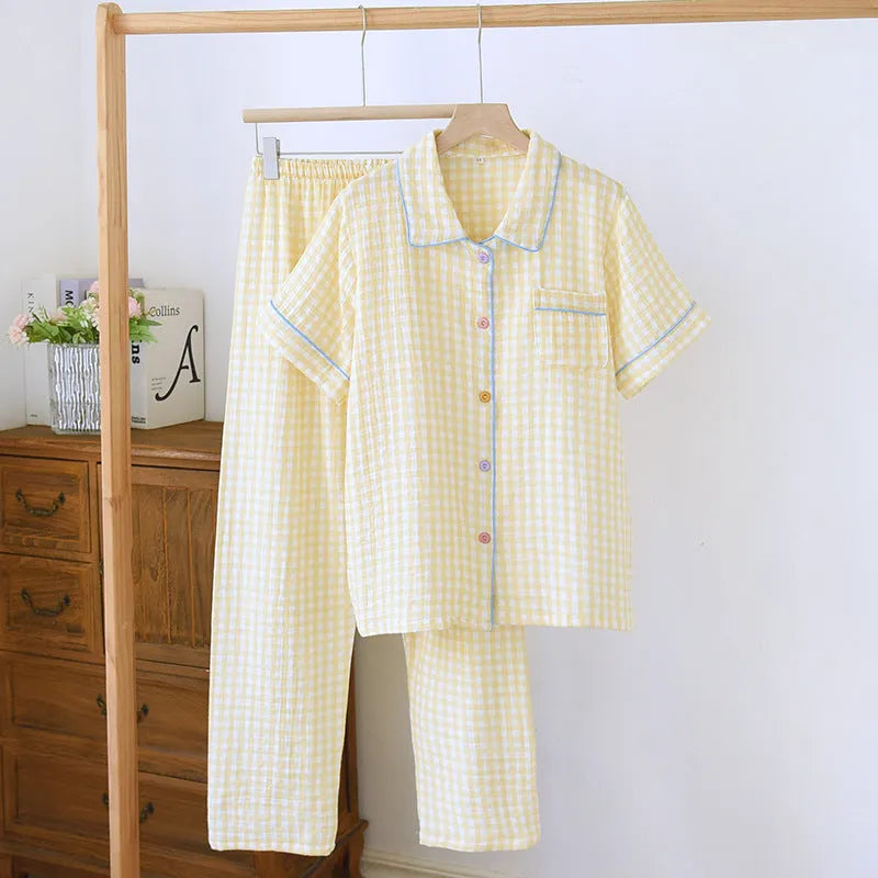 Washed cotton short-sleeved trouser set in a loose, casual style for summer, shown in a floral or plaid pattern.