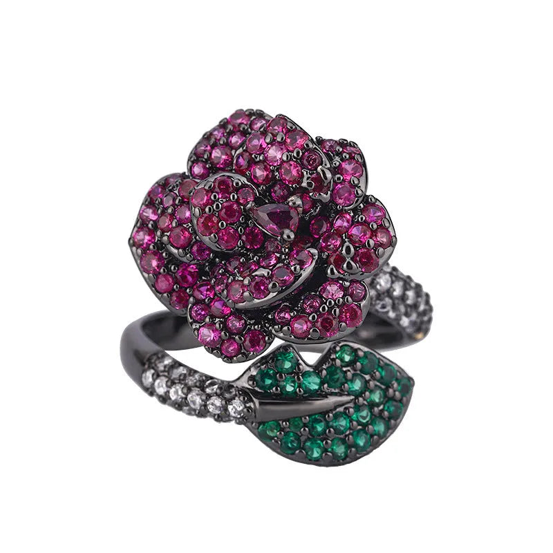 Black gold geometric flower ring with diamond-treated simulation red corundum stone