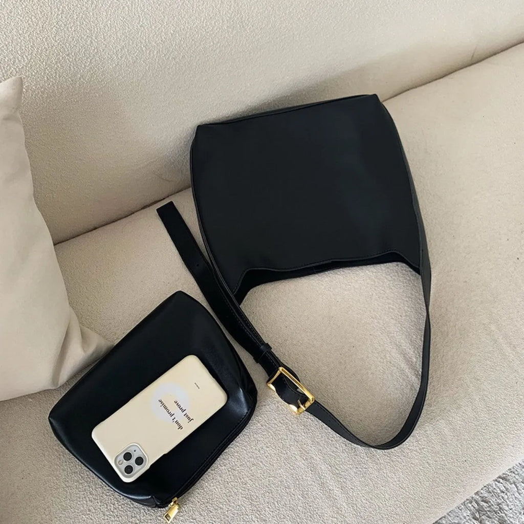 Women's soft PU leather shoulder bag with decorative swing threads in black or brown colour options